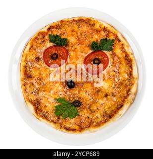Restourant serving dish for child`s menu - pizza with face Stock Photo